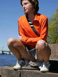 Sporty gal in smooth pantyhose giving good view of her nylon pussy outdoors pictures at find-best-teens.com