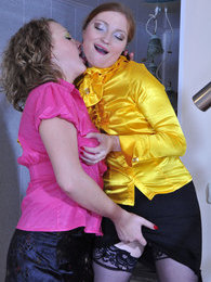 Dressed up lesbians tongue-kissing and licking each other by the stairs pictures