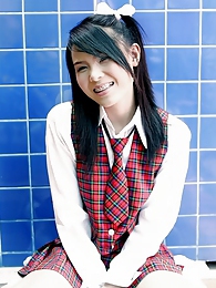 Lorita Ivy playing the schoolgirl with braces and uniform pictures at kilolesbians.com