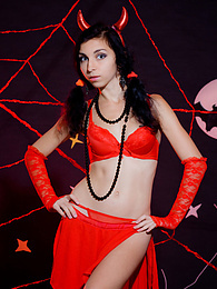 Only one look in the eyes of this fantastic slim teen will tell that she is a little devil inside. No further costume is needed. pictures