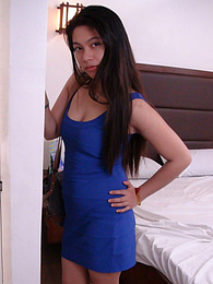 Sultry raven-haired Filipina tart in blue dress drains cum from foreign cock pictures