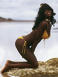 Amazing long hair ebony babe in bikini sexy posing outdoor