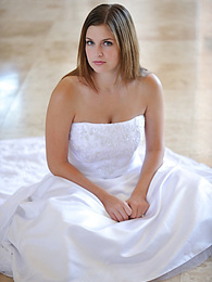 Busty glamorous amateur Danielle models wedding gown indoors & by the pool